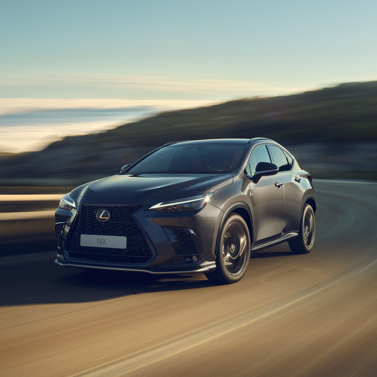 A Lexus NX driving